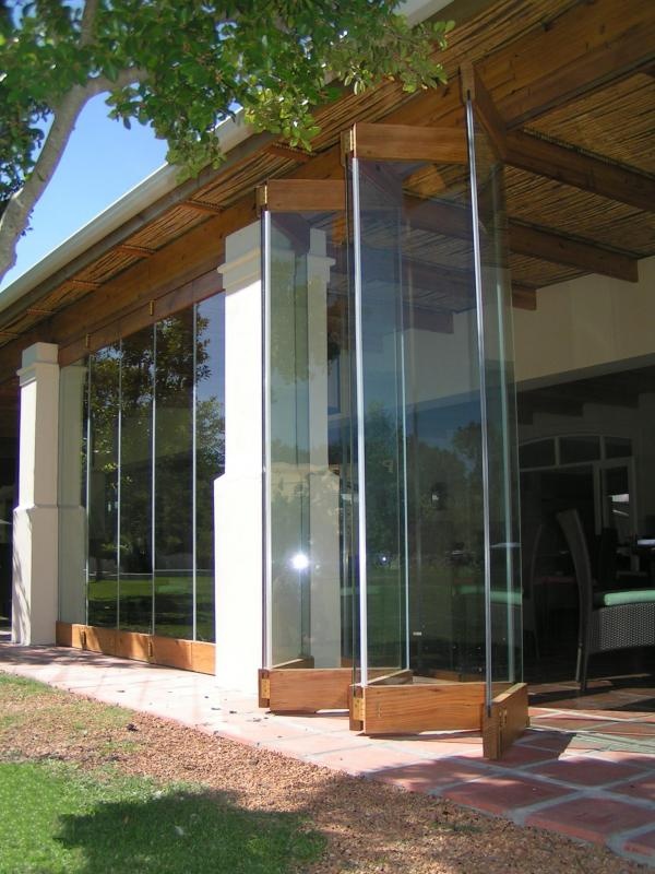 Wooden Frameless Stacking Doors Forest Creations with unique shape wooden rooftop in restaurant