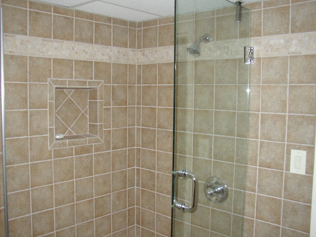 amusing bath tile ideas with glass door and classic shower head design and soap place