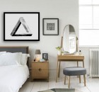 minimalist scandinavian bedroom with small headboard with grey color and white wooden floor and large window