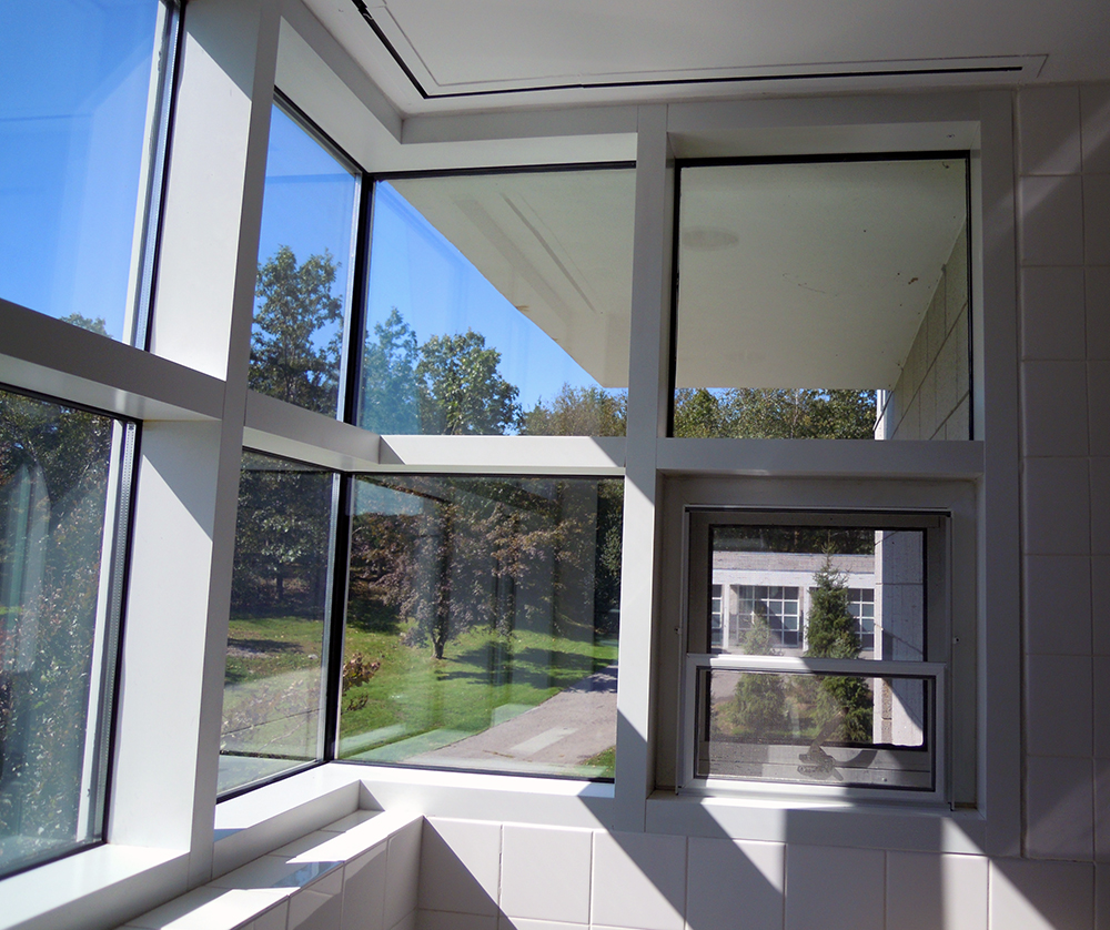 Framless Windows Bathroom clean glass and grey treatment in modern home